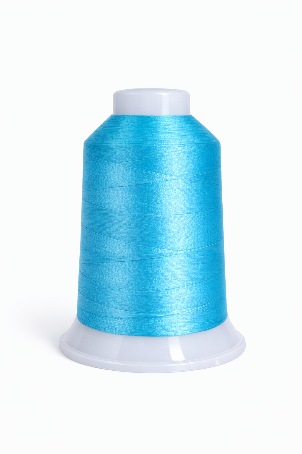Blue spool of thread on a white background
