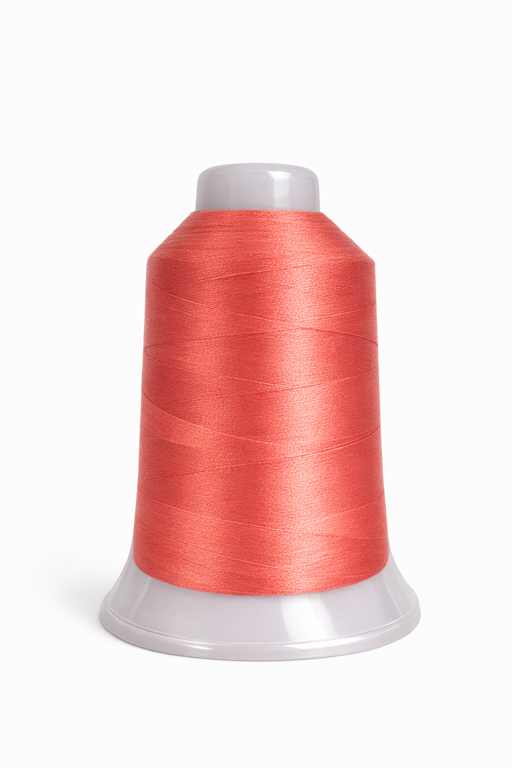 Spool of red thread on a white background