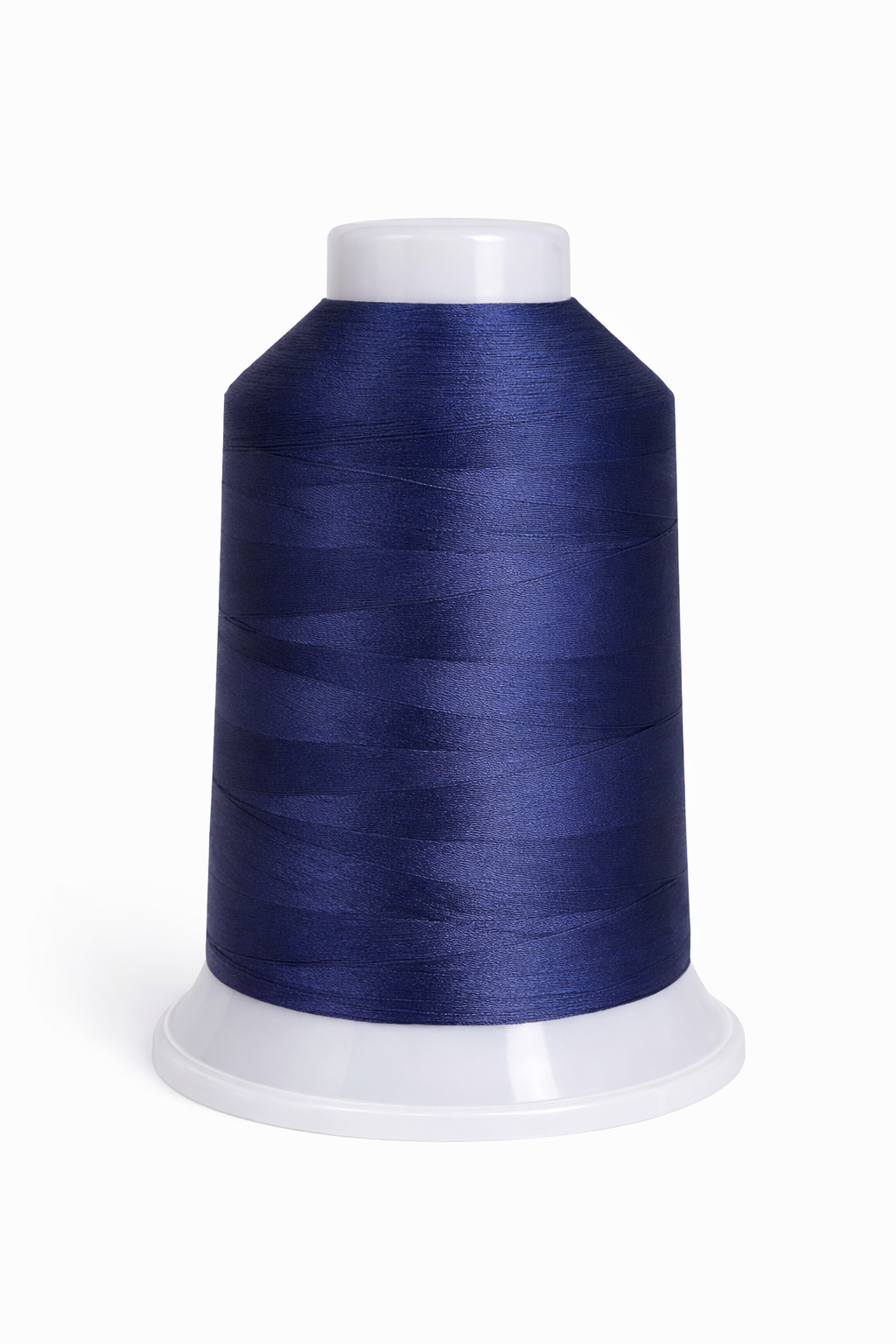 Spool of blue thread on a white background