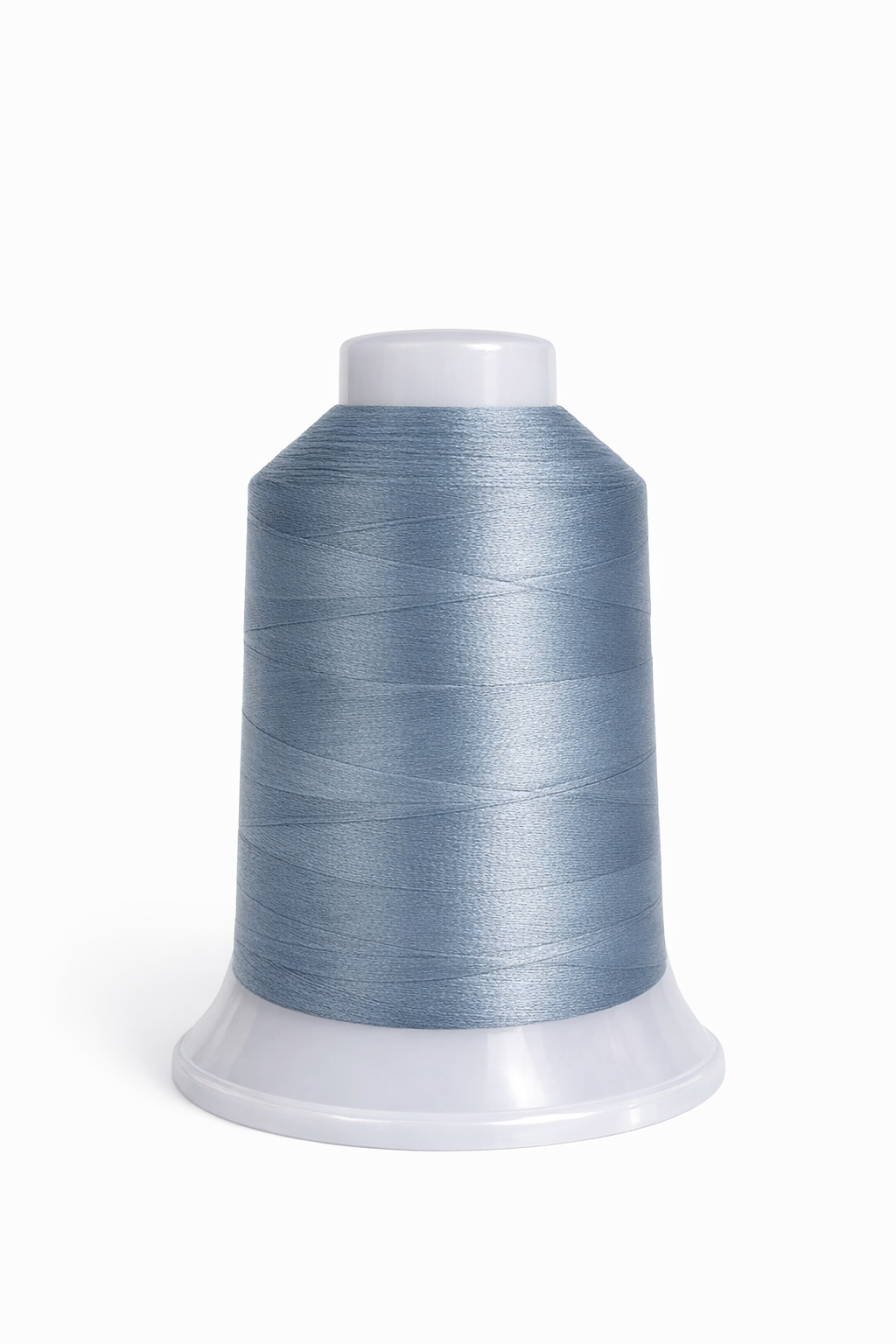 Spool of blue thread on a white background