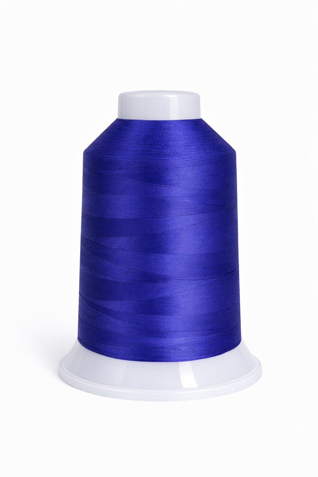 Spool of blue thread on a white background