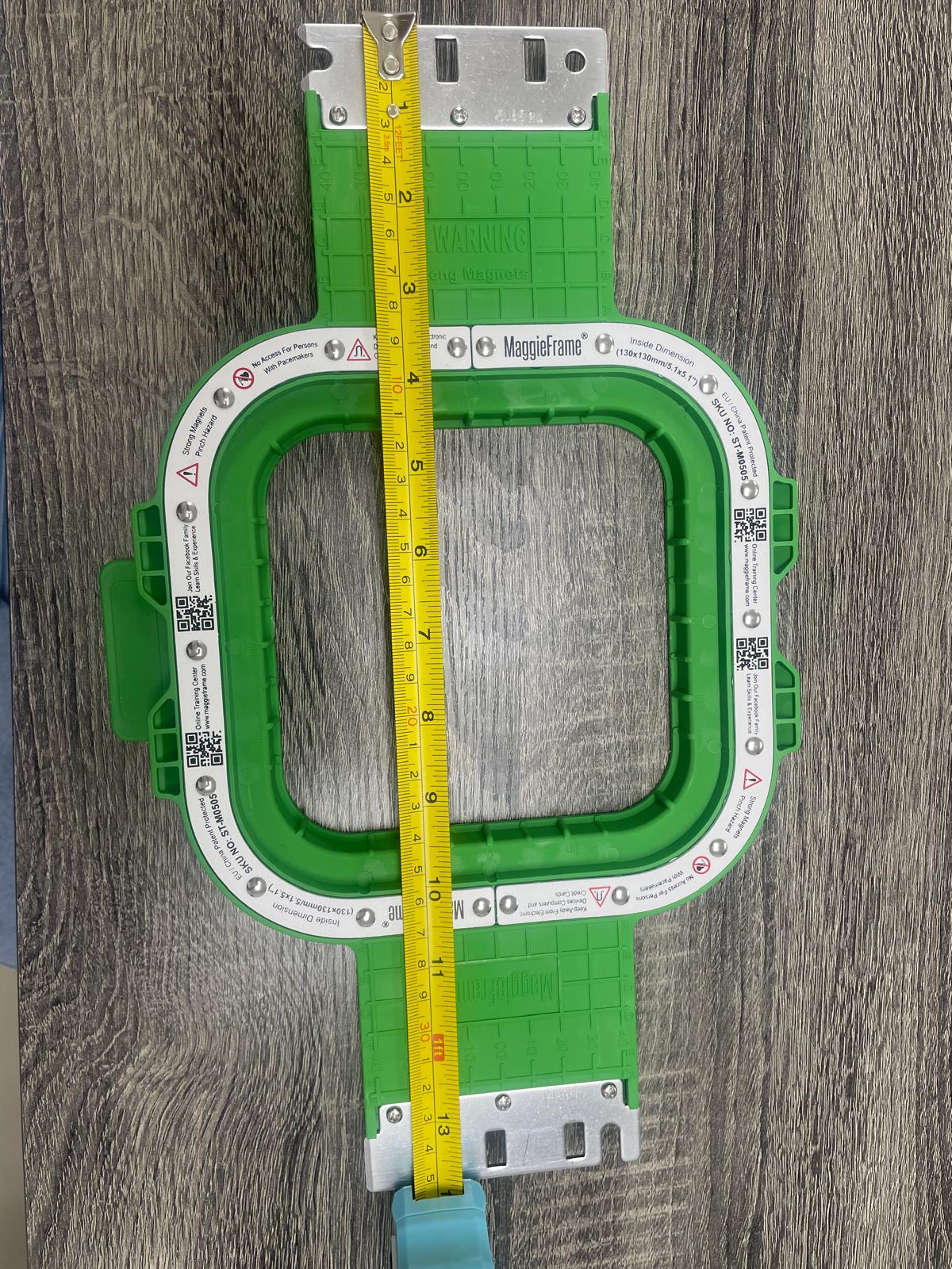 magnet hoop 5.1 inch with a yellow ruler on a wooden surface
